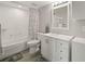Bathroom featuring a tub with shower, and vanity with great storage space at 831 Retreat Blvd # 103, Davenport, FL 33897