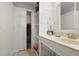 Bathroom with built in shelves and closet provides storage and functionality at 942 Cinnamon Ct, Altamonte Springs, FL 32714