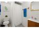 White bathroom featuring a vanity, toilet, and bathtub with shower curtain at 942 Cinnamon Ct, Altamonte Springs, FL 32714