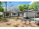 This charming home features a well-maintained lawn, mature trees, and an attached garage, perfect for comfortable living at 942 Cinnamon Ct, Altamonte Springs, FL 32714