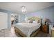 The main bedroom has natural light, a ceiling fan and is decorated with a soothing blue at 942 Cinnamon Ct, Altamonte Springs, FL 32714