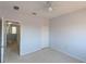 This bedroom has neutral walls, a closet, and a ceiling fan at 9620 Doris Ln, Orlando, FL 32829