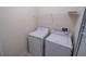 Laundry room with newer washer and dryer at 9620 Doris Ln, Orlando, FL 32829