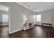 Bonus room with laminate wood floors, natural light, and neutral paint at 10316 Spring Arbor Ln, Winter Garden, FL 34787