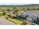 Exterior aerial of townhomes near a playground and green spaces, showcasing community amenities and landscaping at 10316 Spring Arbor Ln, Winter Garden, FL 34787