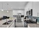 Bright, modern kitchen with stainless steel appliances, granite counters, and backsplash at 10316 Spring Arbor Ln, Winter Garden, FL 34787