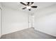 Neutral bedroom with carpeting, a ceiling fan, and a doorway to another room at 1042 Catfish Creek Ct, Oviedo, FL 32765