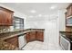 Updated kitchen featuring granite countertops, stainless appliances, and a mosaic backsplash at 1042 Catfish Creek Ct, Oviedo, FL 32765