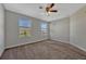 Bright bedroom with a neutral color palette and large windows at 11880 Sonnet Ave, Orlando, FL 32832