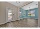 Bright entryway with stylish tile floors, complemented by neutral and blue-toned walls at 11880 Sonnet Ave, Orlando, FL 32832