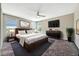 Serene main bedroom featuring large windows and a ceiling fan at 11880 Sonnet Ave, Orlando, FL 32832