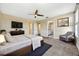 Spacious main bedroom with ample closet space and a ceiling fan at 11880 Sonnet Ave, Orlando, FL 32832