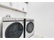 Well-equipped laundry room with new Samsung washer and dryer at 1232 Celery Oaks Ln, Sanford, FL 32771