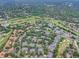 Aerial view of community with lush landscaping and golf courses at 139 Durham Pl, Longwood, FL 32779