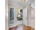 Light-filled entryway featuring hardwood floors, tiled flooring, and a view of the outdoors at 139 Durham Pl, Longwood, FL 32779