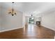 Spacious living room featuring hardwood floors, a fireplace, and access to the outdoors at 139 Durham Pl, Longwood, FL 32779