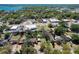 A stunning aerial view showcasing the neighborhood and the proximity to local commercial properties at 1503 Holly Rd, Lakeland, FL 33801