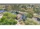 Aerial view of the property showcasing its location and the surrounding neighborhood with mature trees at 155 Aunt Polly Ct, Orlando, FL 32828