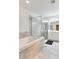 Beautiful bathroom featuring a soaking tub and glass-enclosed shower at 15837 Sweet Lemon Way, Winter Garden, FL 34787