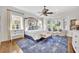 Spacious main bedroom features large windows, natural light, and elegant furnishings creating a serene retreat at 1911 Stonehurst Rd, Winter Park, FL 32789