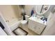 Functional bathroom equipped with a vanity, toilet, and bathtub at 1972 Lake Atriums Cir # 200, Orlando, FL 32839