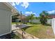 Backyard with a patio and pergola set up for outdoor gatherings under the shade at 2046 Ambergris Dr, Orlando, FL 32822