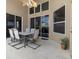 Patio with a dining table set and sliding glass doors at 2248 Wyndham Palms Way, Kissimmee, FL 34747