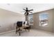 Office space featuring a fan with a light, natural light, and great furniture at 2342 Gold Dust Dr, Minneola, FL 34715