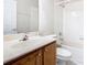 Bathroom with a vanity, mirror, toilet, and a shower-tub combo at 253 Lake Cassidy Dr, Kissimmee, FL 34759