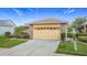 Beautiful single-Gathering home with a manicured lawn and welcoming curb appeal at 253 Lake Cassidy Dr, Kissimmee, FL 34759