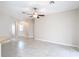 Open living room with tile flooring at 253 Lake Cassidy Dr, Kissimmee, FL 34759