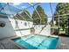 Enclosed pool with an outdoor shower, ideal for recreation and relaxation at 2537 Renshaw St, Kissimmee, FL 34747