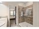 Bathroom boasts a beautifully tiled shower with a glass door and views into the main bedroom at 3242 Irish Peach Dr, Winter Garden, FL 34787