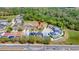 Aerial view of the home's location showing backyard pools, community, and proximity to the street at 368 Sand Ridge Dr, Davenport, FL 33896