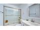This bathroom includes a walk-in shower and modern fixtures at 368 Sand Ridge Dr, Davenport, FL 33896