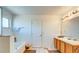 Bright bathroom features a bath and shower, a vanity, and tiled floors at 368 Sand Ridge Dr, Davenport, FL 33896