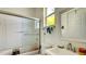 Bathroom features a shower with glass door at 368 Sand Ridge Dr, Davenport, FL 33896
