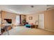 Bedroom featuring a large window and carpeted floors at 368 Sand Ridge Dr, Davenport, FL 33896
