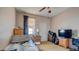 Bedroom featuring a single bed and side table with lamp at 368 Sand Ridge Dr, Davenport, FL 33896