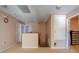 Upstairs hallway with several doors and neutral decor at 368 Sand Ridge Dr, Davenport, FL 33896