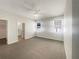 Bright bedroom featuring neutral walls, carpet, and a ceiling fan for comfortable living at 3882 Crawley Down Loop, Sanford, FL 32773