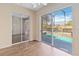 Bedroom with pool access showcasing the indoor-outdoor flow of the home at 4724 Sable Ridge Ct, Leesburg, FL 34748