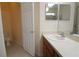 Bathroom featuring vanity with sink, a door to the toilet and bright lighting at 4852 Blue Major Dr, Windermere, FL 34786