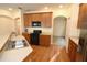 Well-lit kitchen with stainless steel appliances, wood cabinets, and an open layout at 4852 Blue Major Dr, Windermere, FL 34786