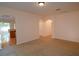 Inviting living room showcases archways, neutral carpet, and hardwood flooring at 4852 Blue Major Dr, Windermere, FL 34786