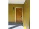 A condo front door with unit number 303 and a secure digital lock at 5271 Images Cir # 303, Kissimmee, FL 34746