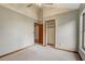 Spacious bedroom featuring neutral carpet, closet and natural light at 5444 Lighthouse Rd, Orlando, FL 32808