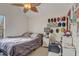 Bedroom with a full sized bed and a ceiling fan at 5444 Lighthouse Rd, Orlando, FL 32808