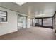 The sunroom features multiple access points and lots of natural light through sliding doors and skylights at 5444 Lighthouse Rd, Orlando, FL 32808