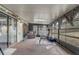 Enclosed sunroom offering space for relaxation and recreation at 5444 Lighthouse Rd, Orlando, FL 32808